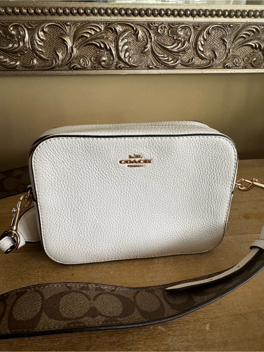 Coach Pebbled Leather Crossbody mini camera in Chalk White with Signature Strap